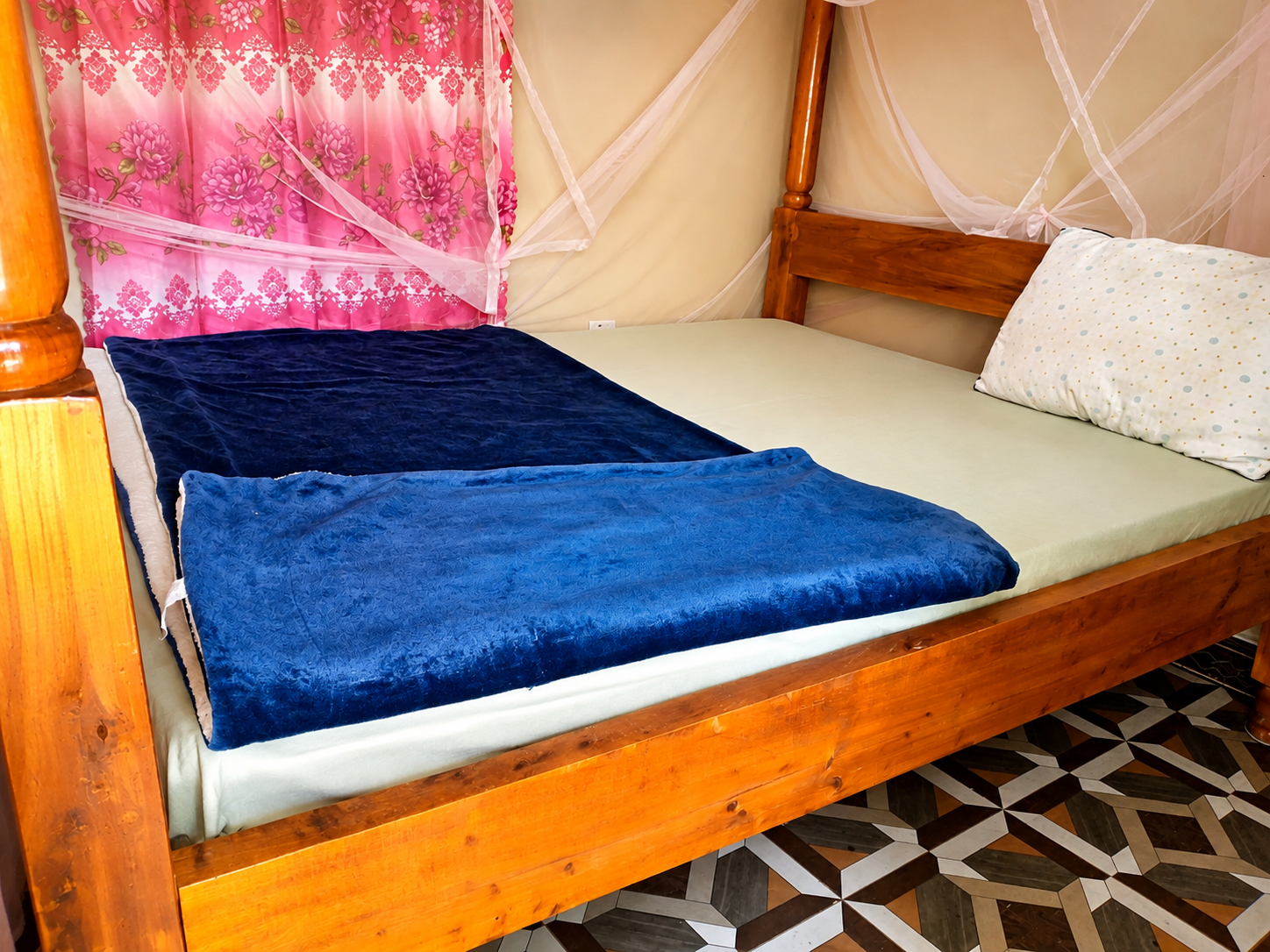 Trattoria lodge room with a neatly prepared bed